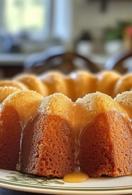 Delicious Classic Vanilla Bundt Cake with a Buttery Crumb Recipe