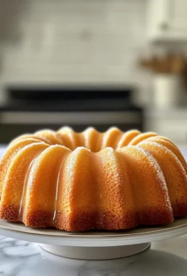 Delicious Classic Vanilla Bundt Cake with a Buttery Crumb Recipe