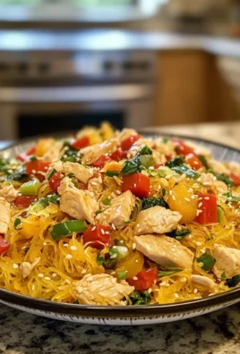 Savory Delicious Spaghetti Squash Chow Mein with Chicken and Veggies